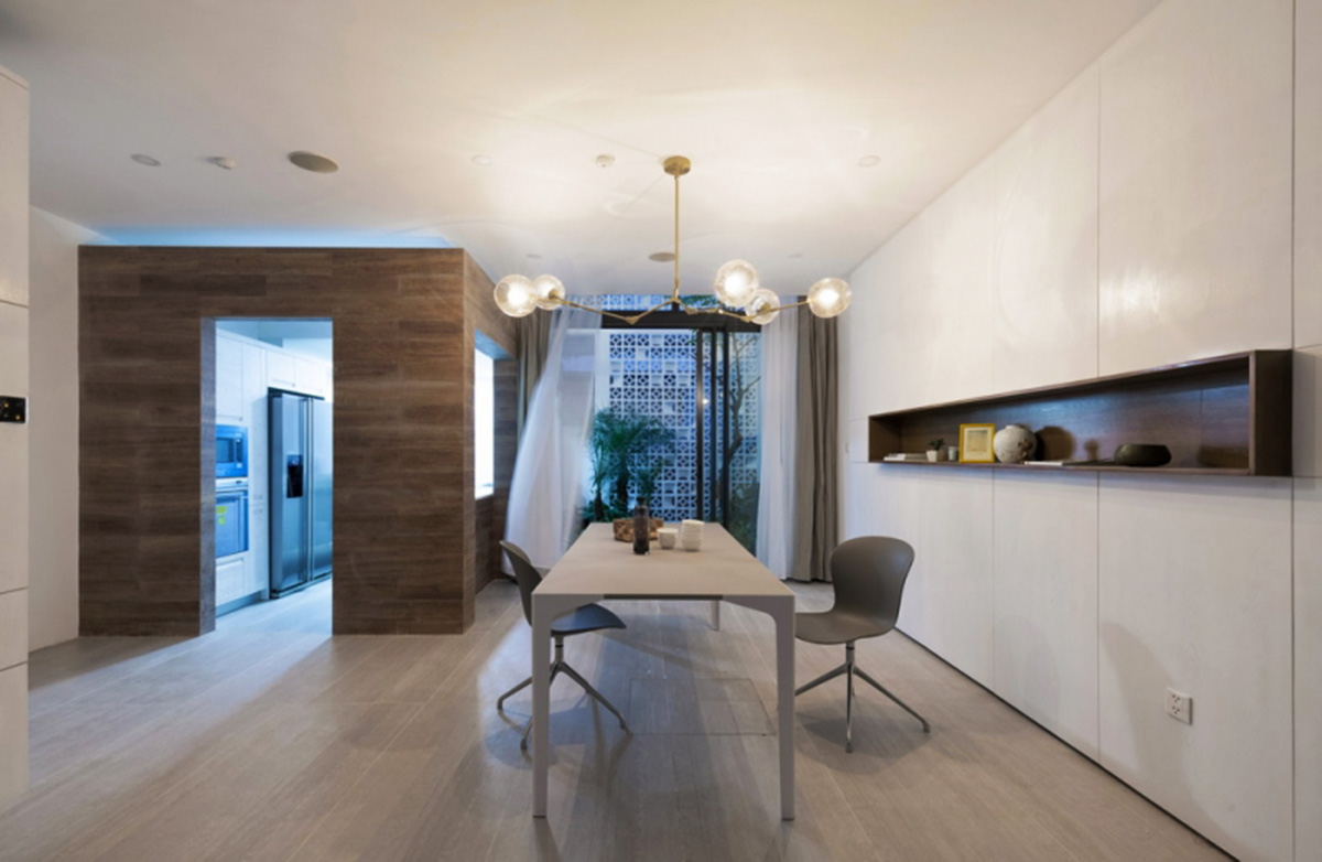 Landmark Architecture converts old brick residential unit into a cocoon house in Vietnam