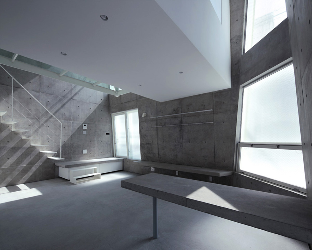 ’Tokyo House’ reflects interior living with a white abstract form emphasizing corner of the street