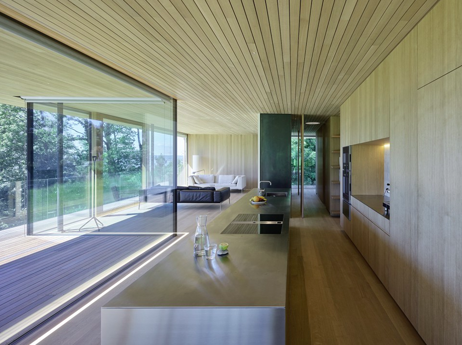 Dietrich | Untertrifaller Architekten completes sandwich-shaped House D on the Bregenz mountain