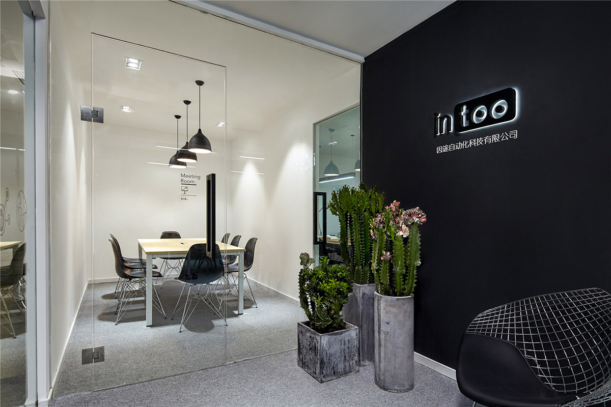 Muxin Design completed Intoo Office in China creating monochromatic style for the IT company