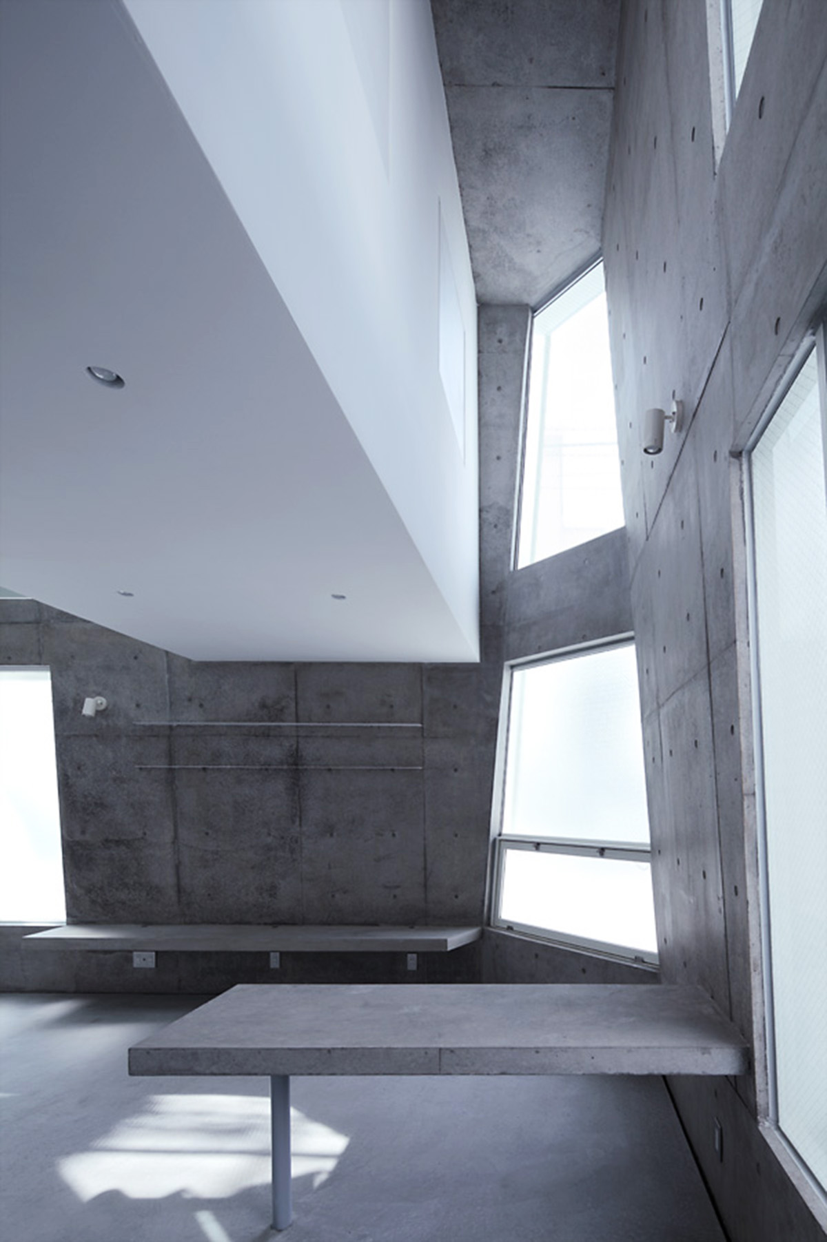 ’Tokyo House’ reflects interior living with a white abstract form emphasizing corner of the street