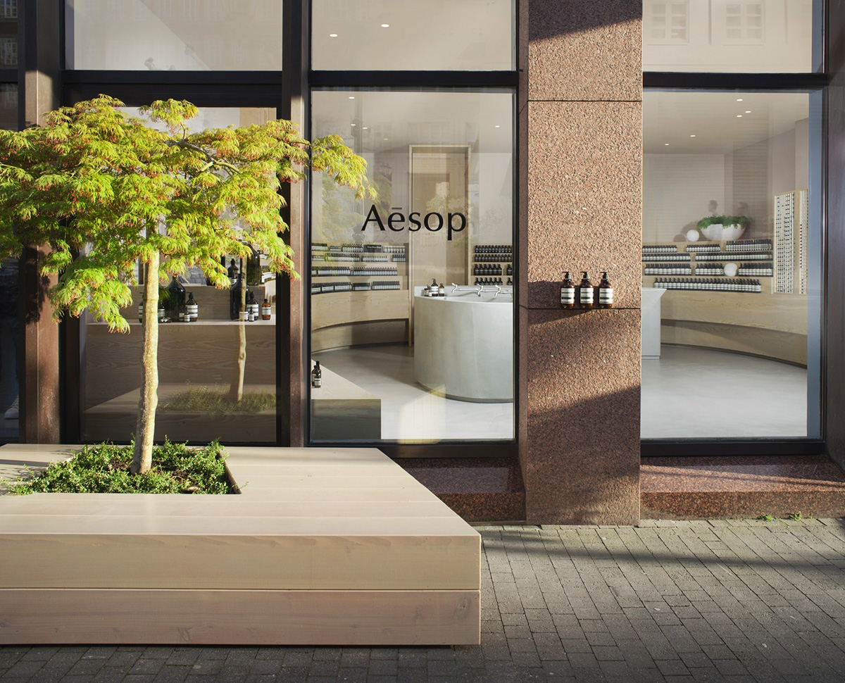 Snøhetta designed curvilinear wooden shelves with pastel colours for Aesop’s new Düsseldorf store