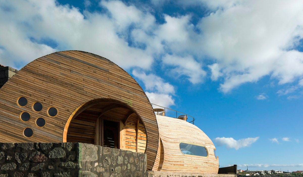 A Cella Bar organically attached to the existing building designed by FCC Arquitectura+Paulo Lobo