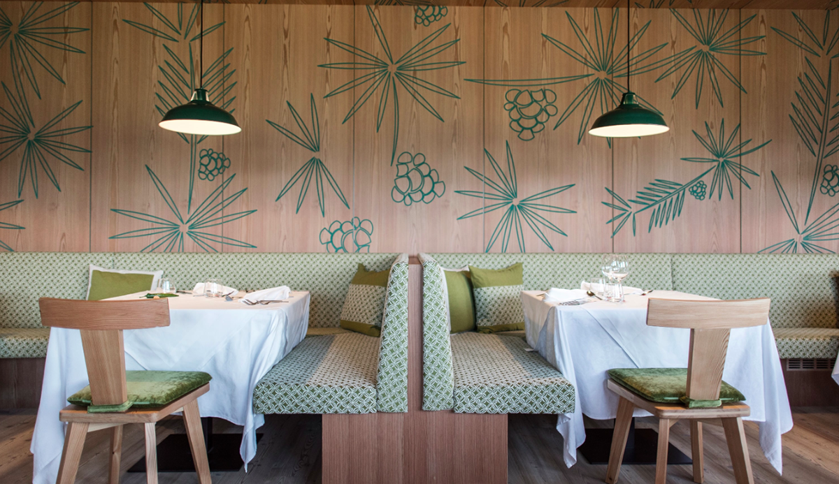 NOA’s Hubertus Hotel in Italy features cantilevering pool looking natural topography of the town