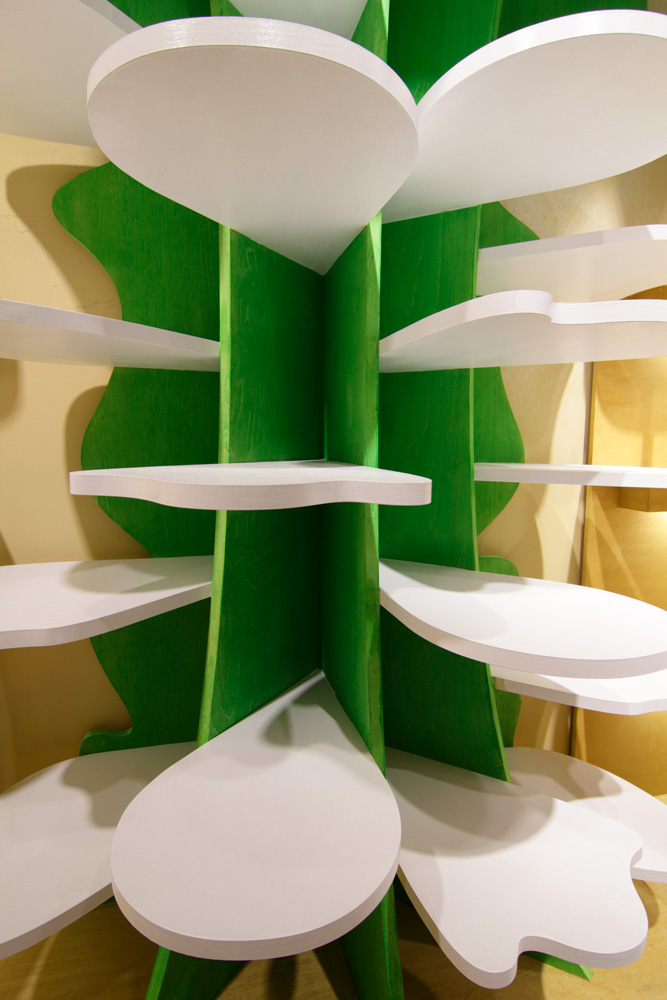 Moriyuki Ochiai Architects combines milky and forested tones with energetic patterns in MOMOM shop