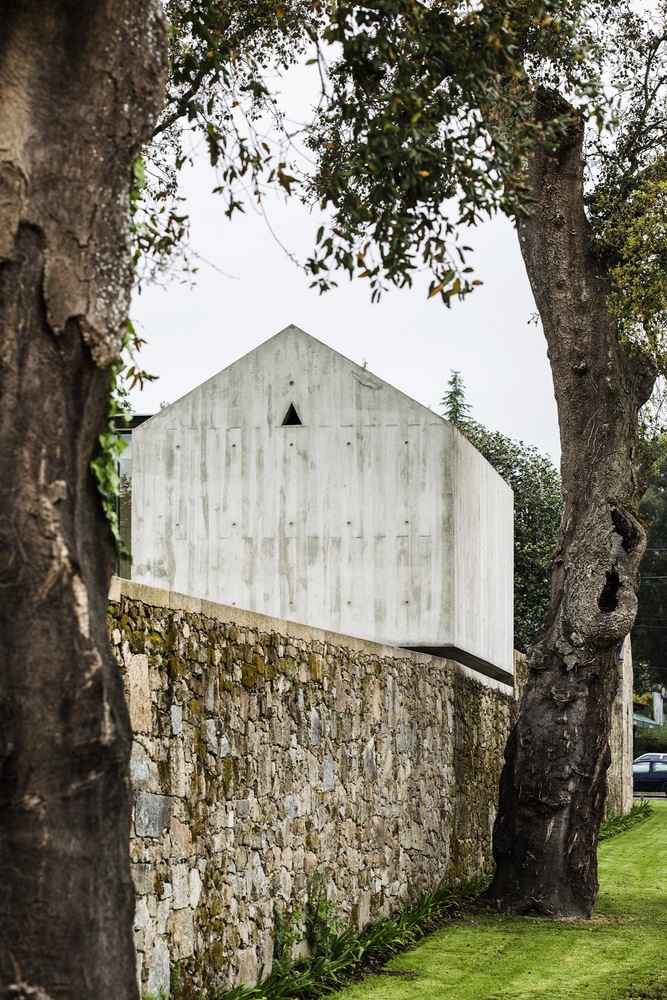 AZO Sequeira Arquitectos Associados converts old Dovecote into a minimal concrete house