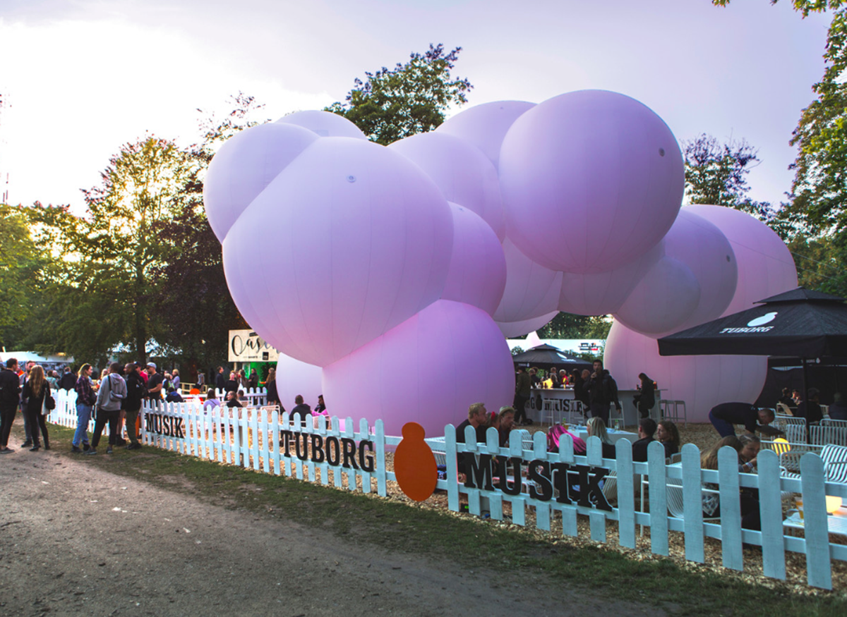 BIG installs a bubble-like cloud pavilion for three Danish Institutions