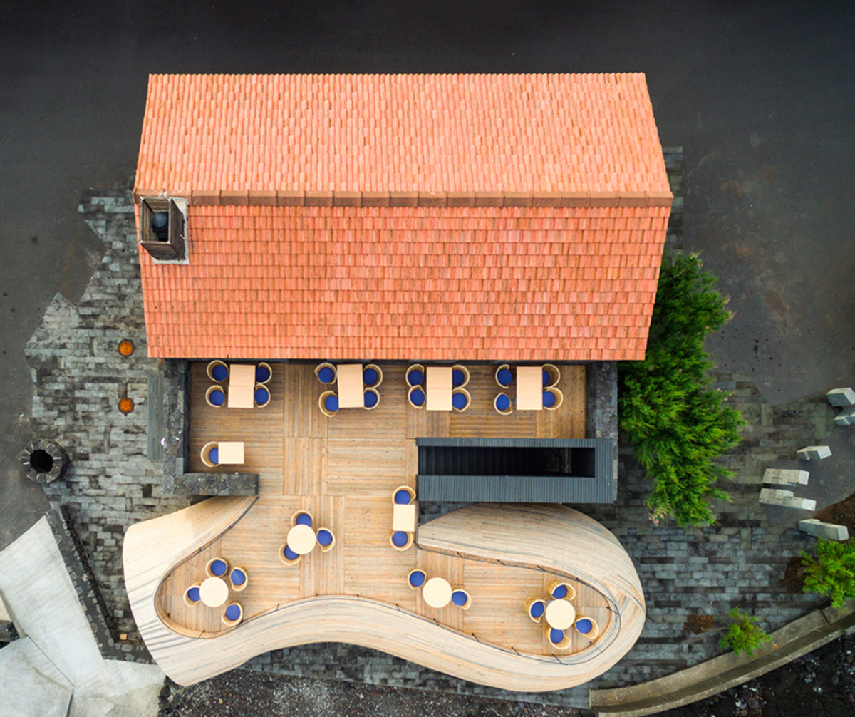 A Cella Bar organically attached to the existing building designed by FCC Arquitectura+Paulo Lobo