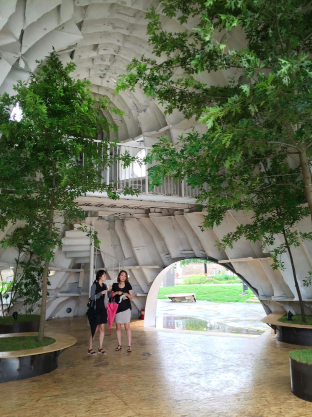 This upside down massive metal pavilion is made of recycled steel parts from an old ship by Shinslab