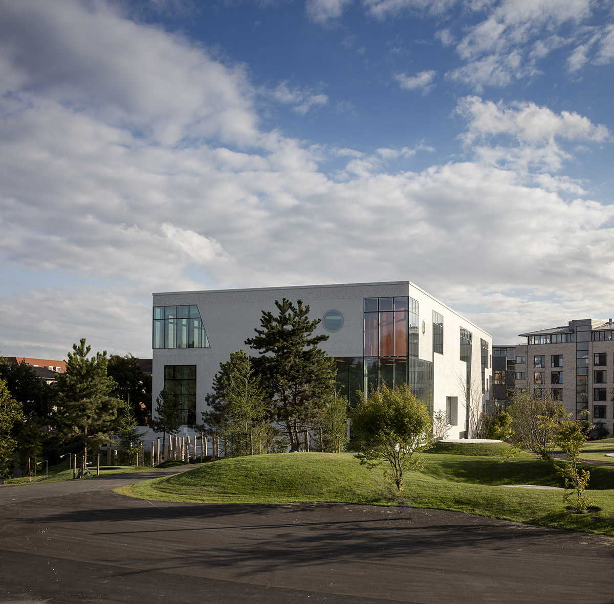 MVDRV and ADEPT’s community centre KuBe featuring playful urban gardens opened in Copenhagen