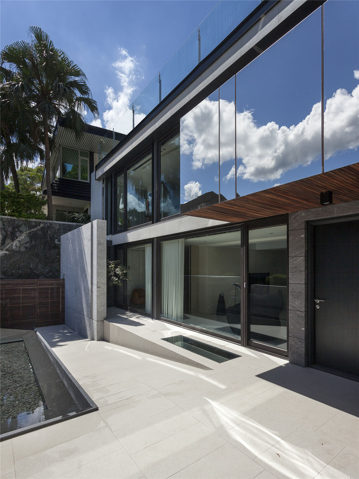 Waterfrom Design&rsquo;s free-plan private residence in Taiwan merges architecture with nature