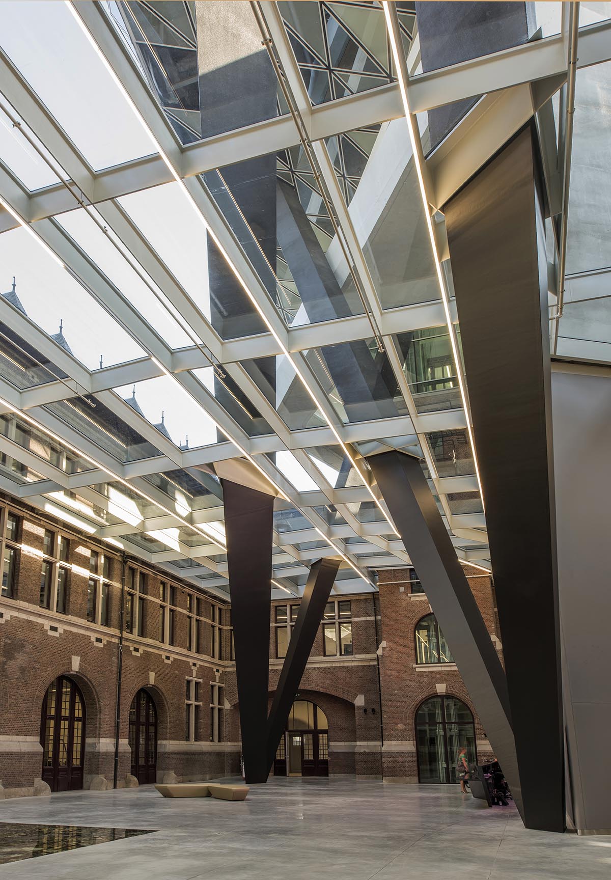 Zaha Hadid Architects crowns Belgium’s historic Antwerp Port Building with a floating glazed tower