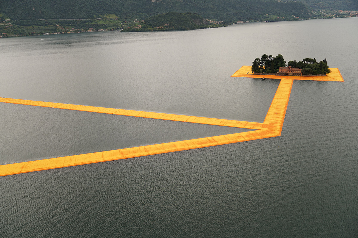 Christo and Jeanne-Claude reimagine Italy&rsquo;s Lake Iseo with shimmering yellow fabric on the water
