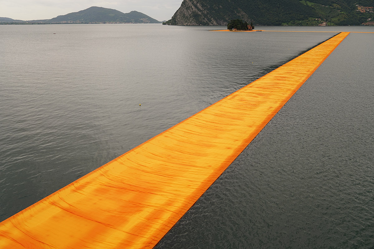 Christo and Jeanne-Claude reimagine Italy&rsquo;s Lake Iseo with shimmering yellow fabric on the water