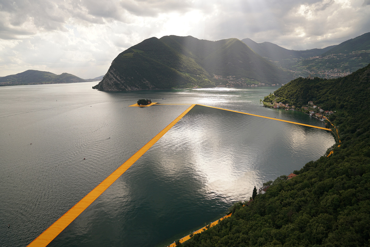 Christo and Jeanne-Claude reimagine Italy&rsquo;s Lake Iseo with shimmering yellow fabric on the water