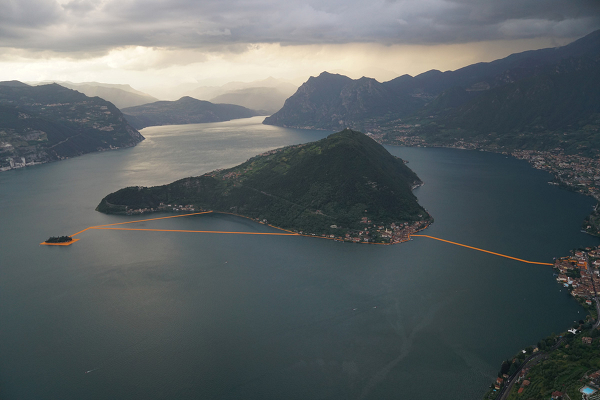Christo and Jeanne-Claude reimagine Italy&rsquo;s Lake Iseo with shimmering yellow fabric on the water