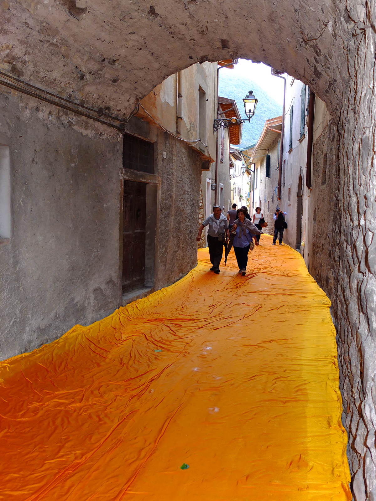 Christo and Jeanne-Claude reimagine Italy&rsquo;s Lake Iseo with shimmering yellow fabric on the water
