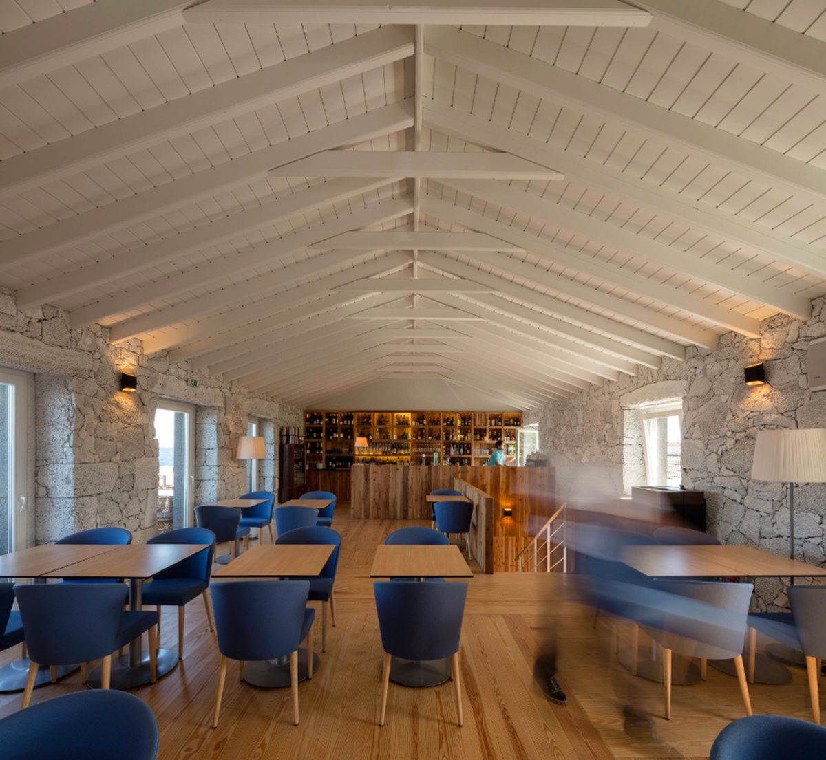 A Cella Bar organically attached to the existing building designed by FCC Arquitectura+Paulo Lobo