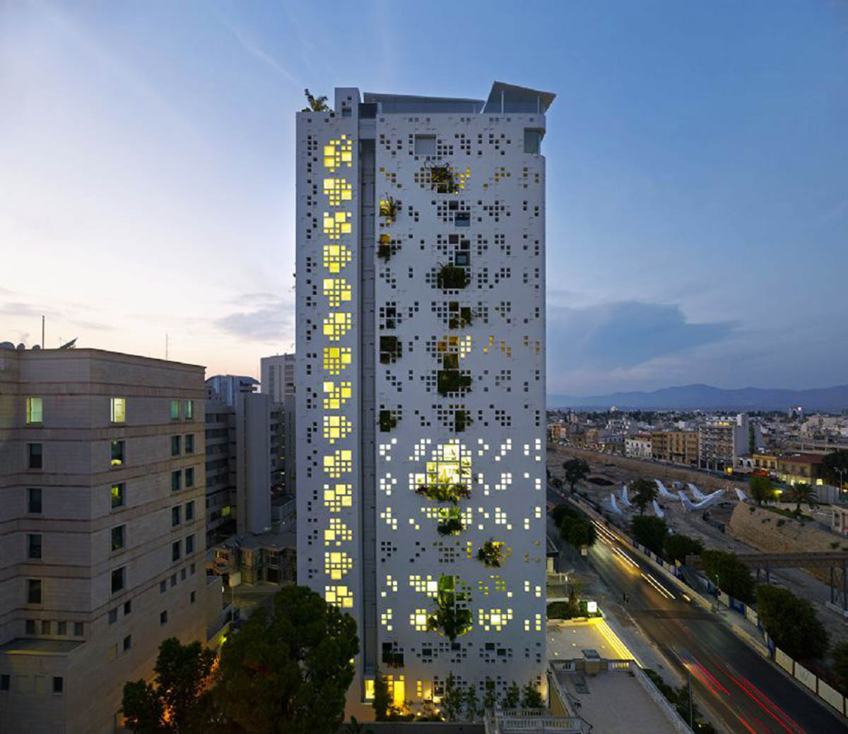 Jean Nouvel’s ’White Walls’ is a vertical landscape tower dominated by pixelated facade in Cyprus