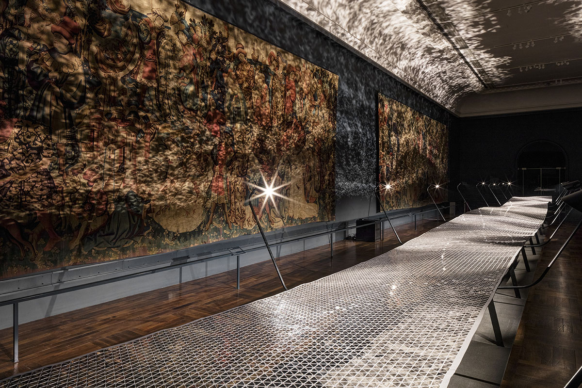Benjamin Hubert+Braun set an immersive Foil morphing lights trilateral in the V&A&rsquo;s Tapestry gallery