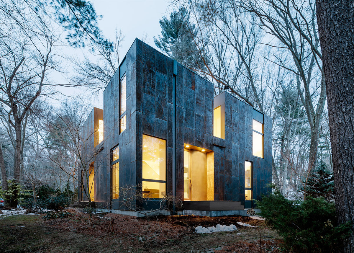 Merge Architects clads this family house with tree-trunk hue weathering steel panels in Lexington
