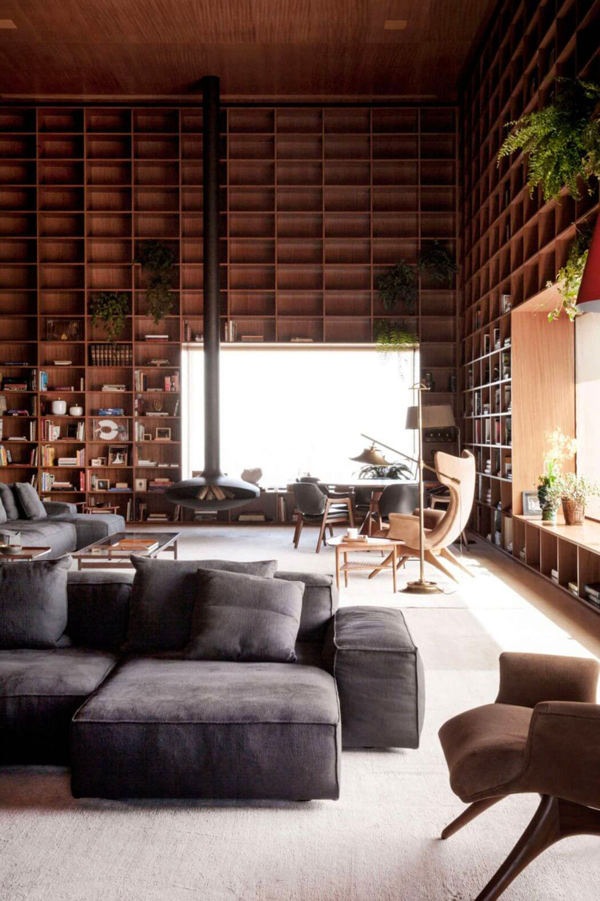 Studio MK27 sets up a reminiscent wooden library in Brazilian SP_Penthouse