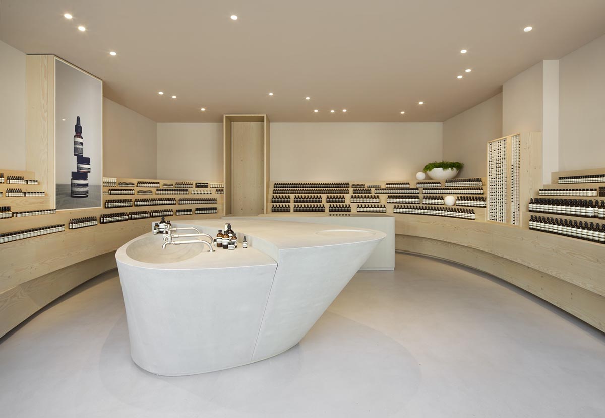 Snøhetta designed curvilinear wooden shelves with pastel colours for Aesop’s new Düsseldorf store