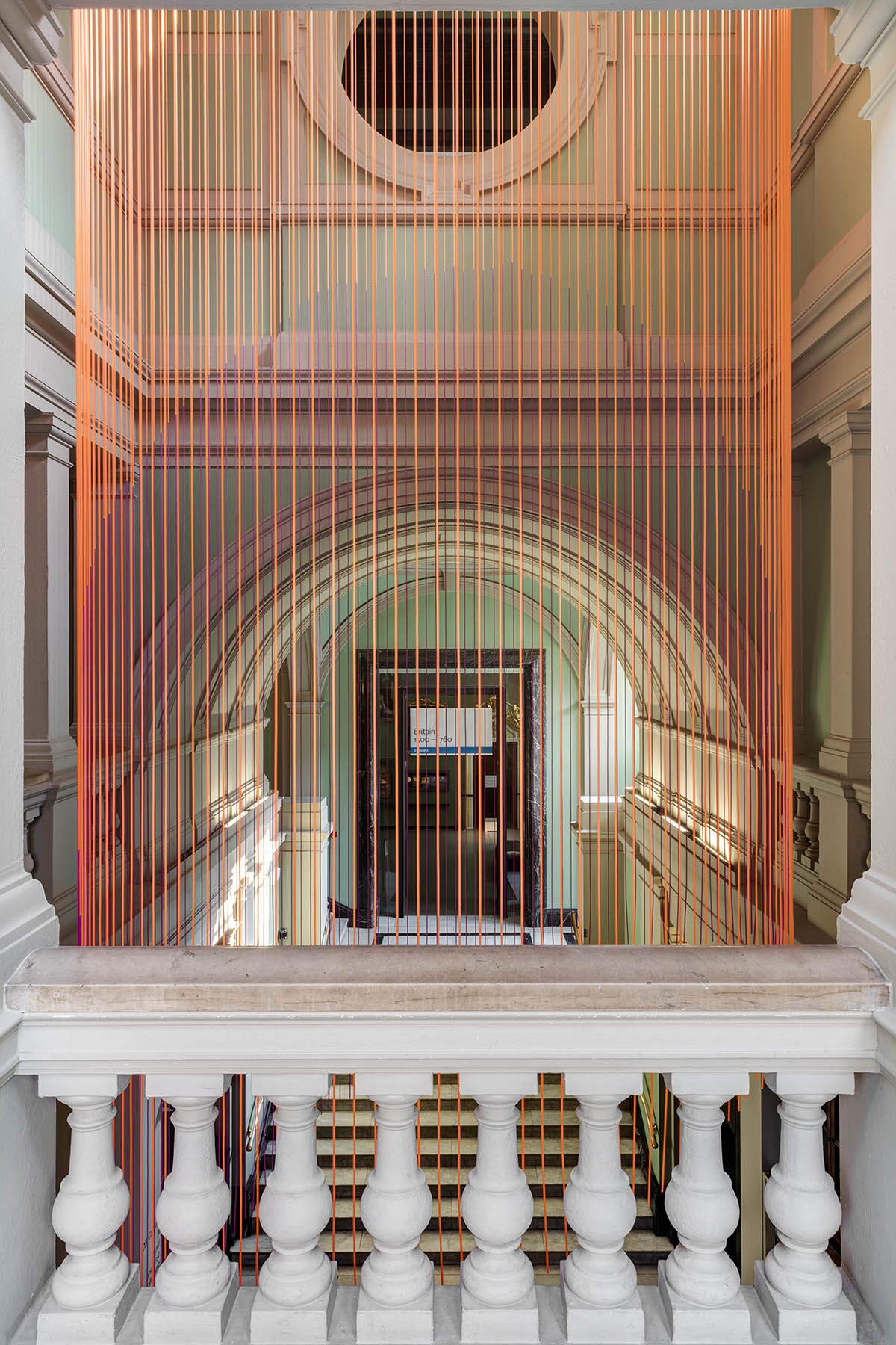 Glithero suspends an abstract version of clock at V&A made up of 160 multicoloured silicone cords