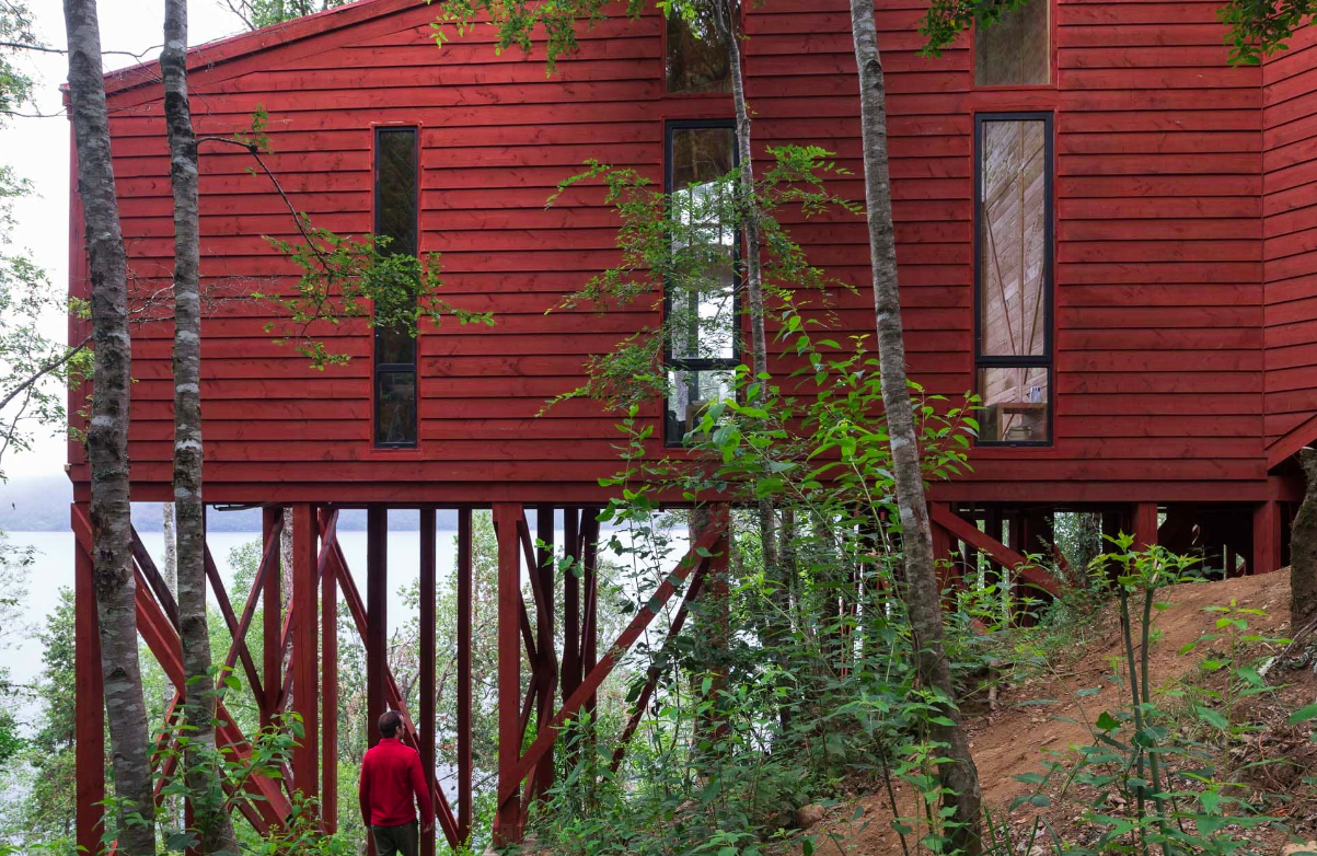 Sebastian Irarrazaval completes snake-shaped 2Y House in Chile’s wild forests