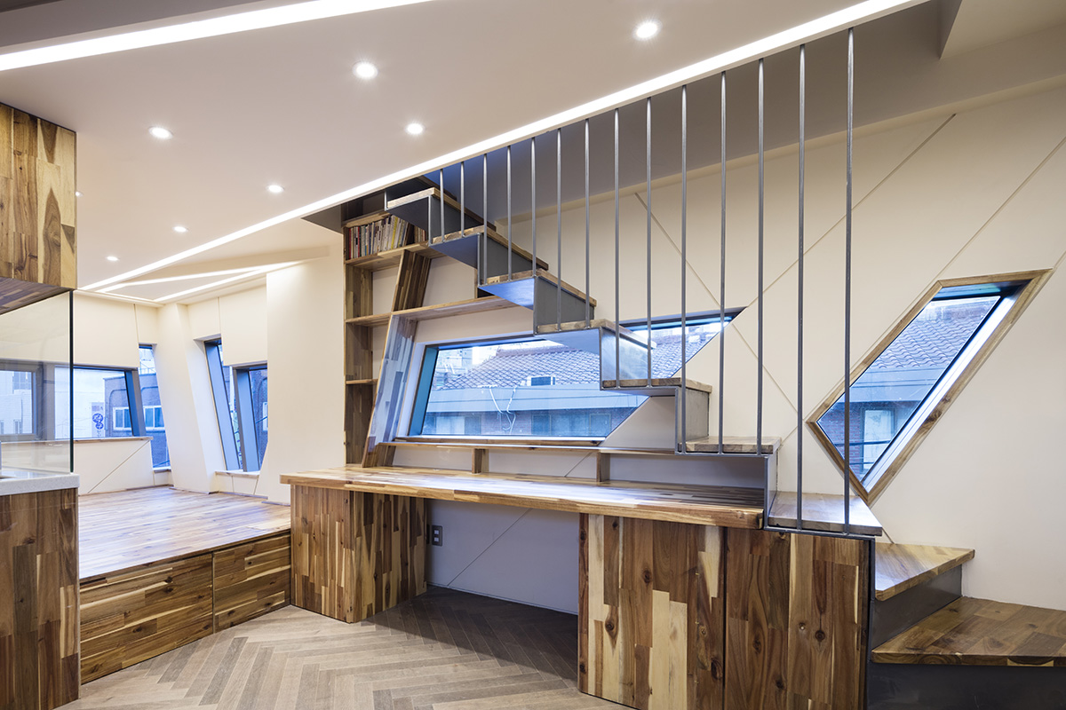 Moon Hoon completes Dogok Maximum mixed-use narrow house in Seoul with randomly drawn windows