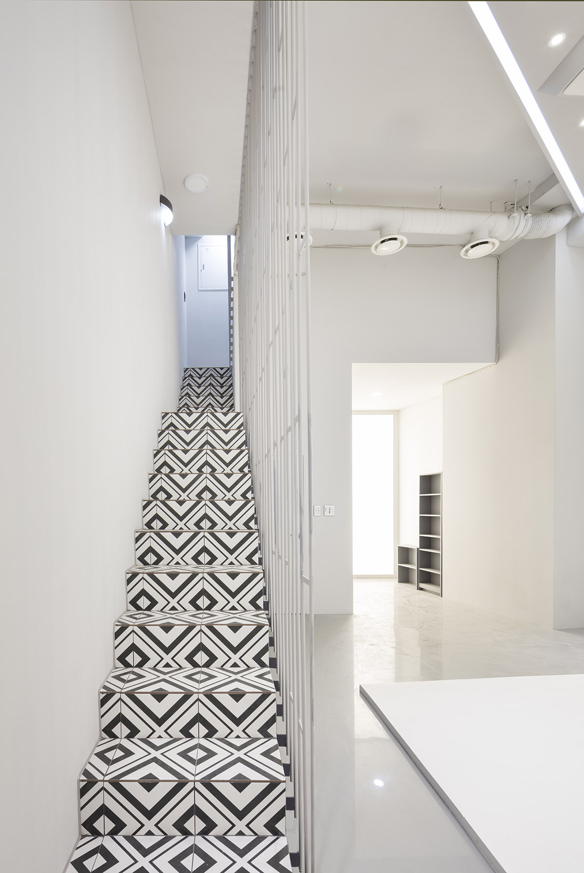 Moon Hoon completes Dogok Maximum mixed-use narrow house in Seoul with randomly drawn windows