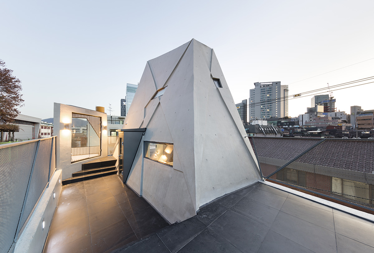 Moon Hoon completes Dogok Maximum mixed-use narrow house in Seoul with randomly drawn windows