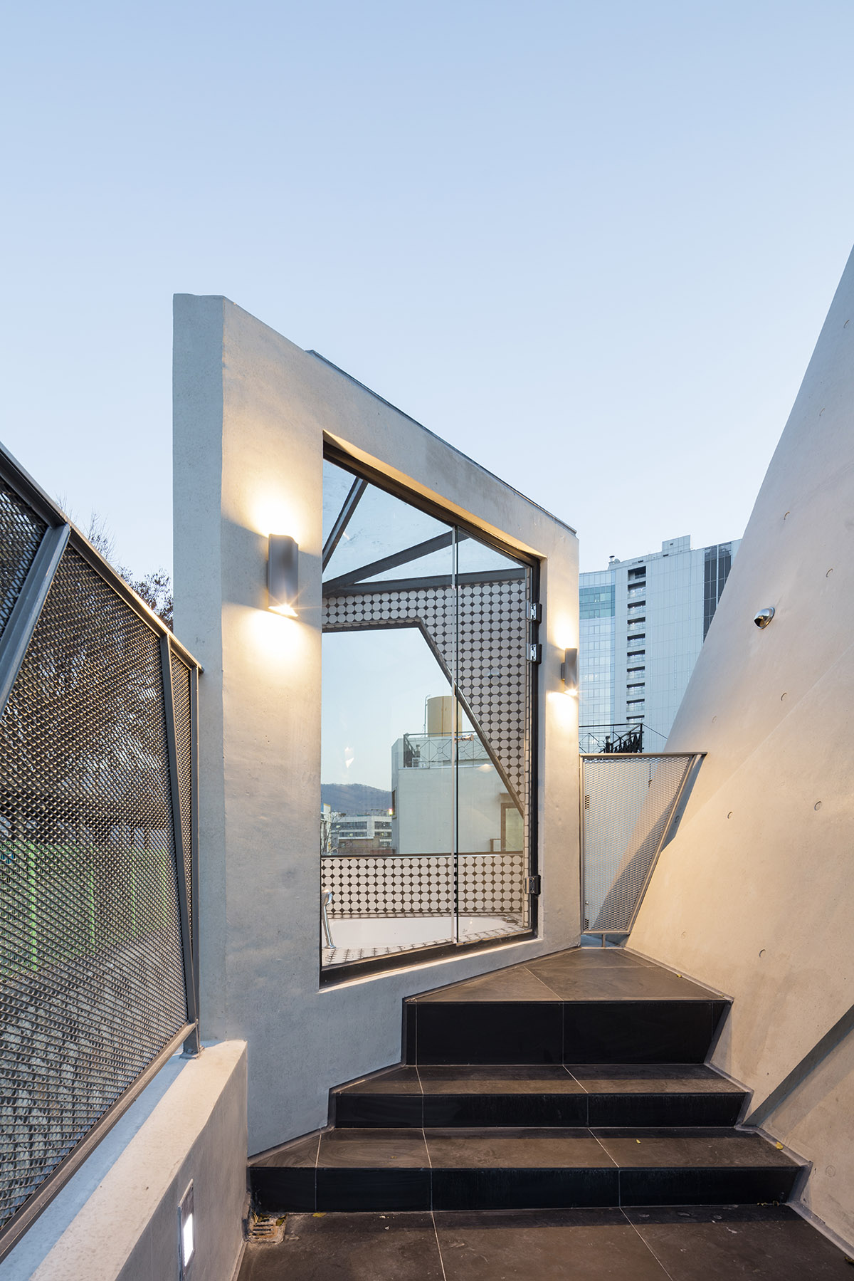 Moon Hoon completes Dogok Maximum mixed-use narrow house in Seoul with randomly drawn windows