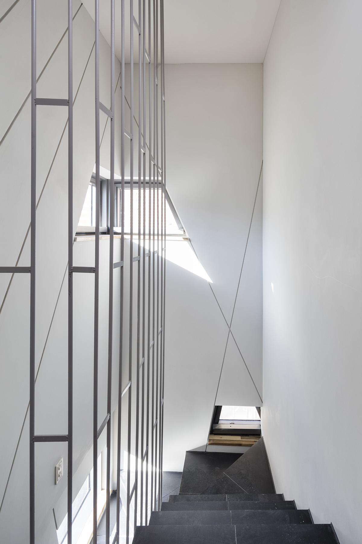 Moon Hoon completes Dogok Maximum mixed-use narrow house in Seoul with randomly drawn windows