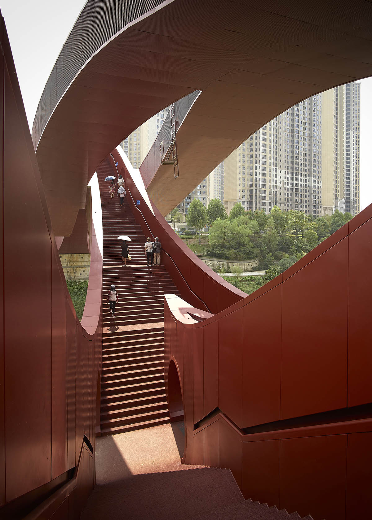 NEXT Architects unveils tortuous mega bridge creating multiple levels for China’s Meixi Lake