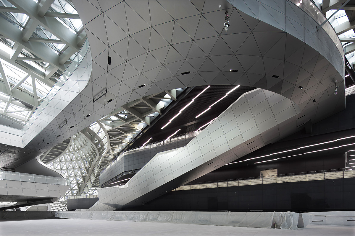 A silvery shining monolithic museum-MOCAPE by Coop Himmelb(l)au opened in Shenzhen