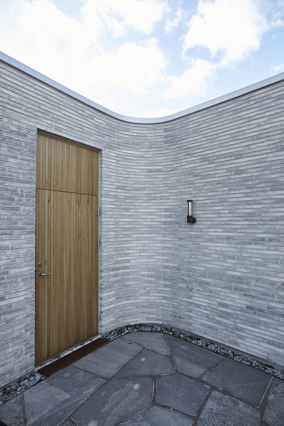 ADEPT completes soft-edged private villa with floating transitions in the interior