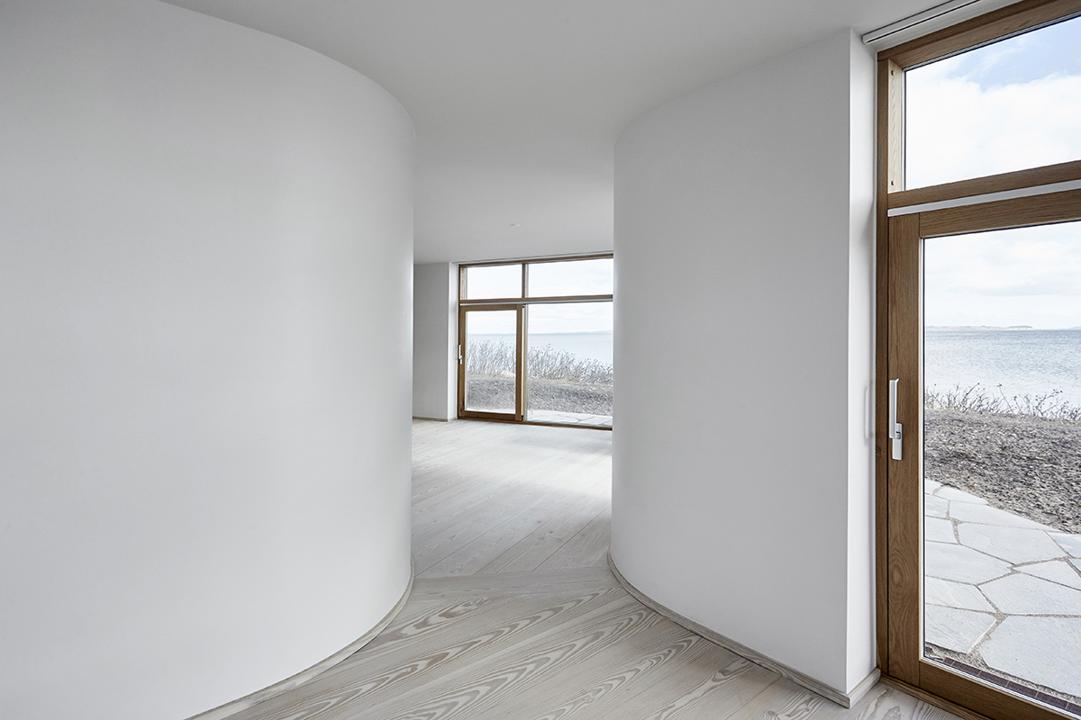 ADEPT completes soft-edged private villa with floating transitions in the interior