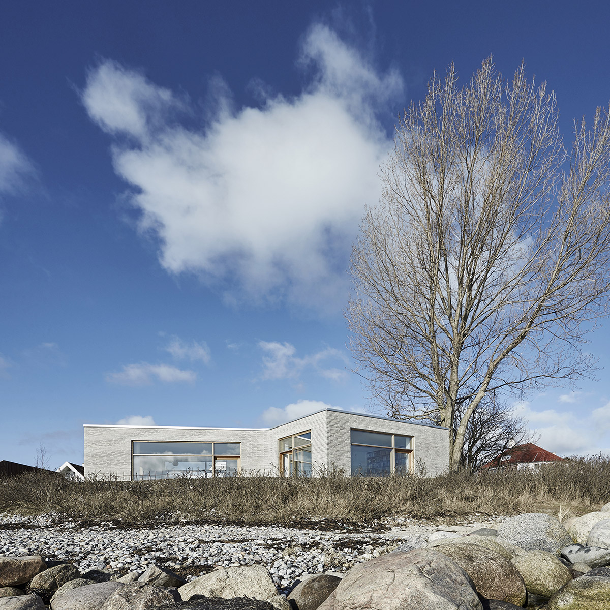 ADEPT completes soft-edged private villa with floating transitions in the interior