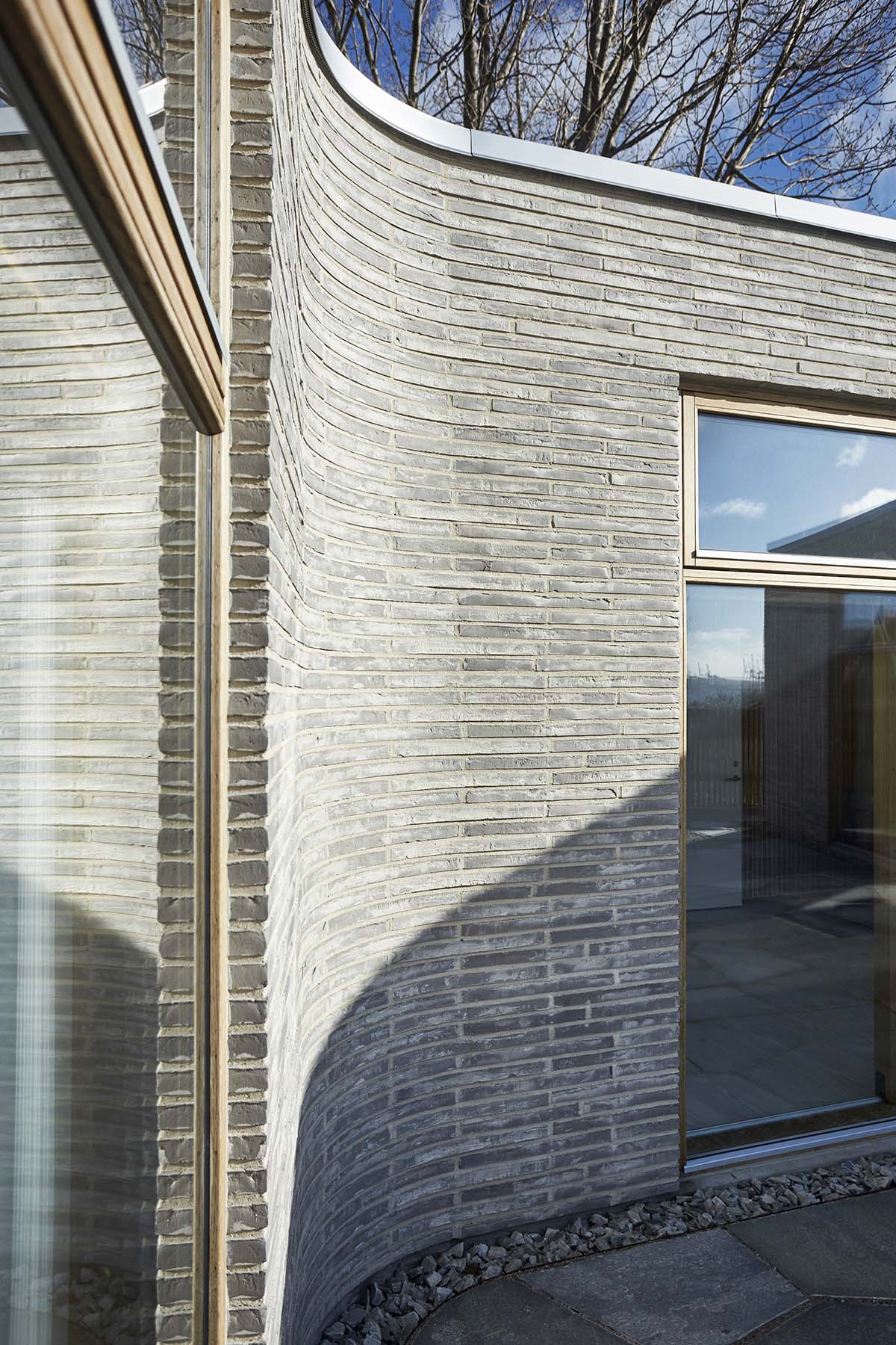 ADEPT completes soft-edged private villa with floating transitions in the interior