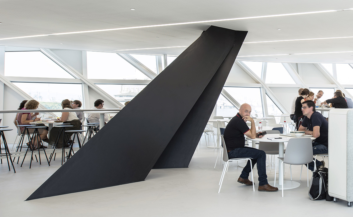 Zaha Hadid Architects crowns Belgium’s historic Antwerp Port Building with a floating glazed tower