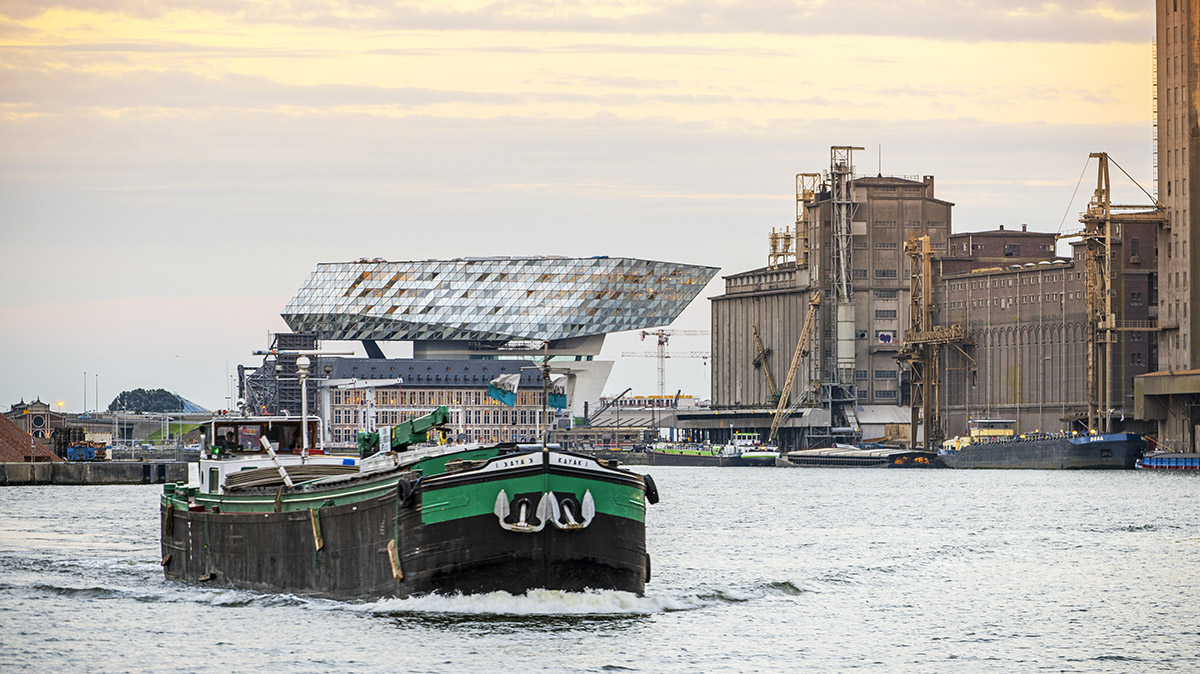 Zaha Hadid Architects crowns Belgium’s historic Antwerp Port Building with a floating glazed tower
