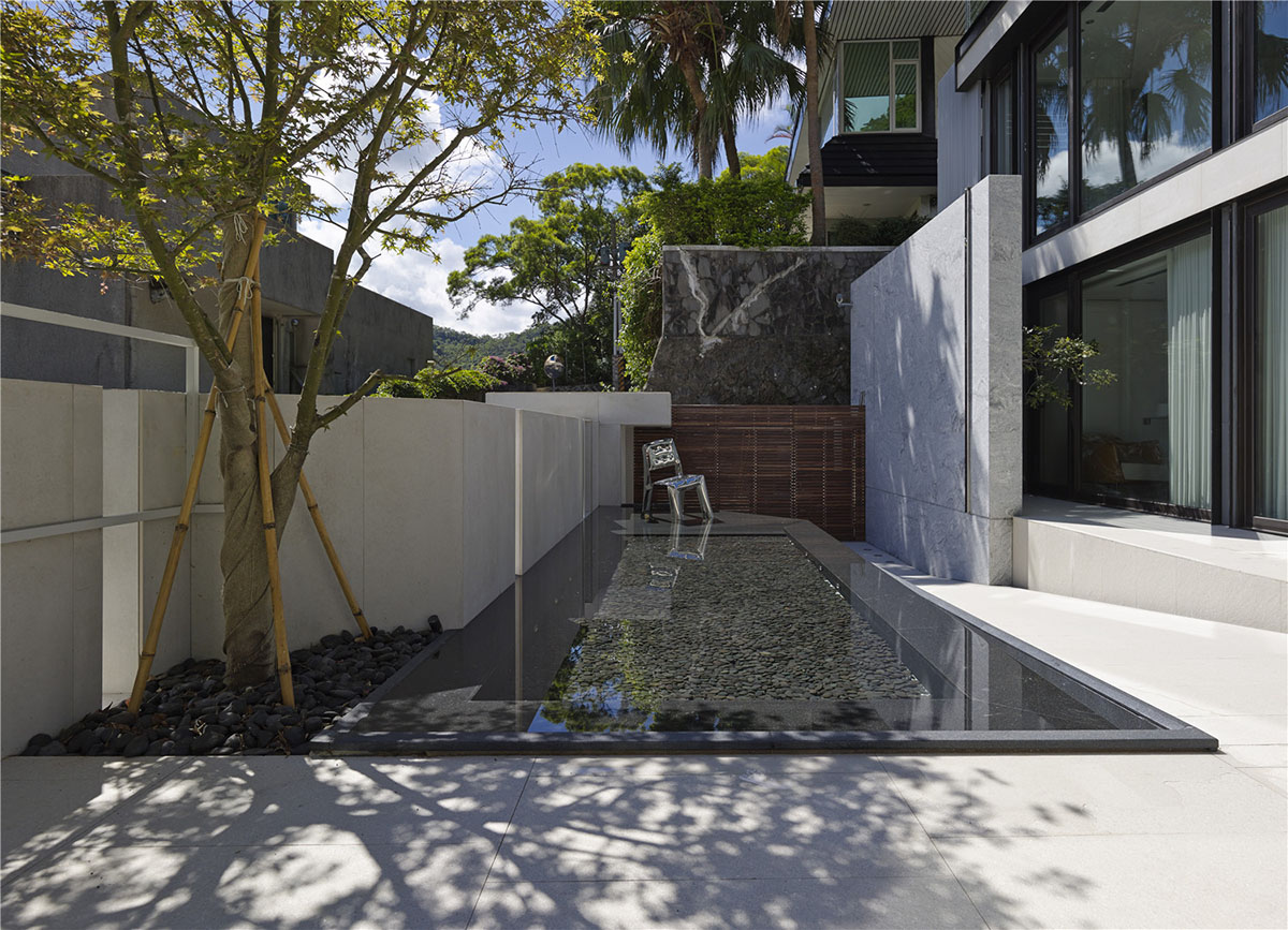 Waterfrom Design&rsquo;s free-plan private residence in Taiwan merges architecture with nature