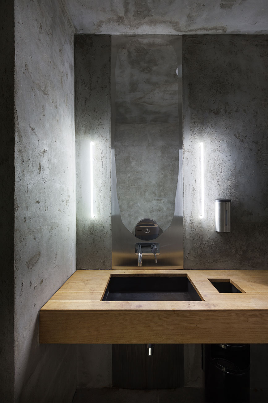 YOD Design Studio hangs thousands of wooden sticks from the ceiling of Burger Joint in Ukraine