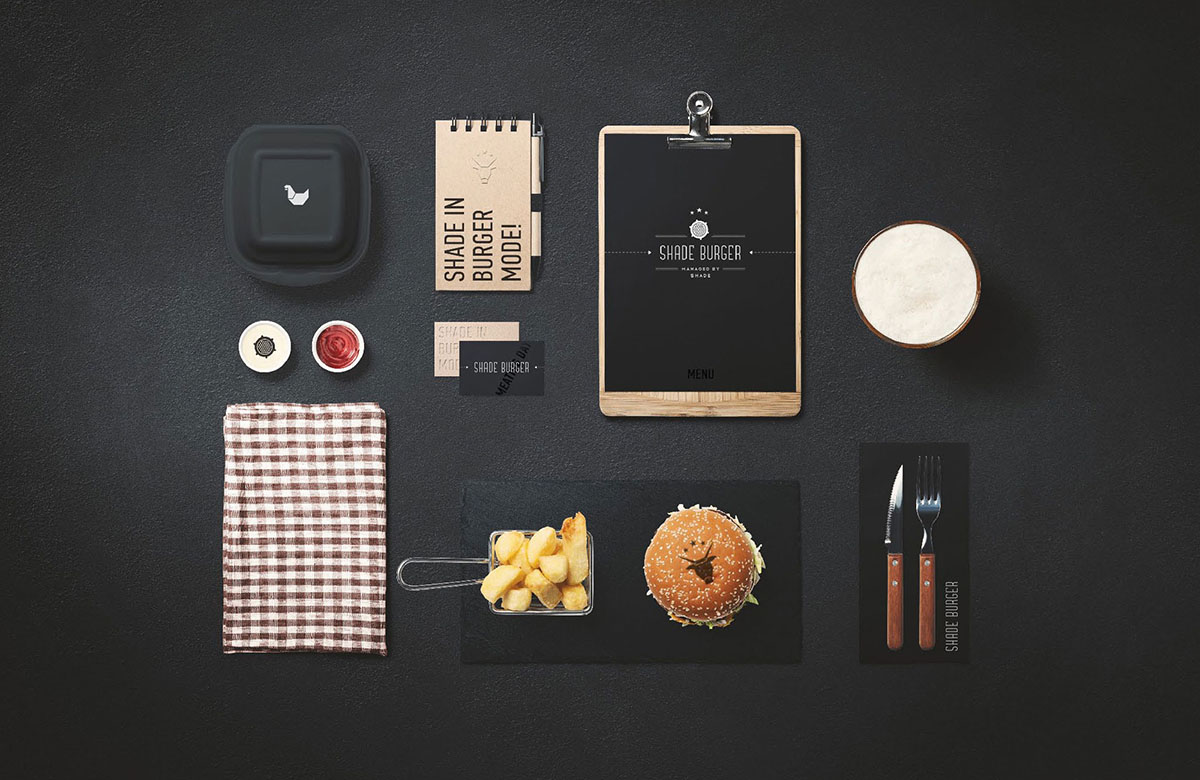 YOD Design Studio hangs thousands of wooden sticks from the ceiling of Burger Joint in Ukraine