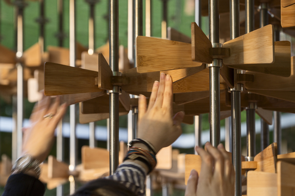 The Pinwheel Pavilion is a self-supporting structure animated by bamboo components in London