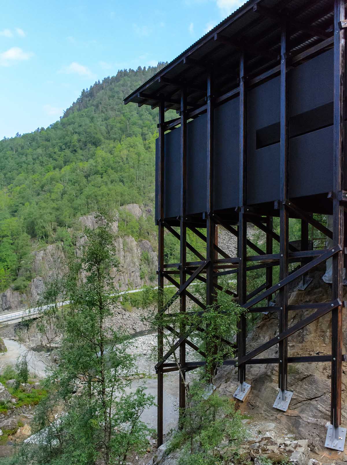 Peter Zumthor installs modest buildings erected on black-winged stilts at Norwegian old mining region
