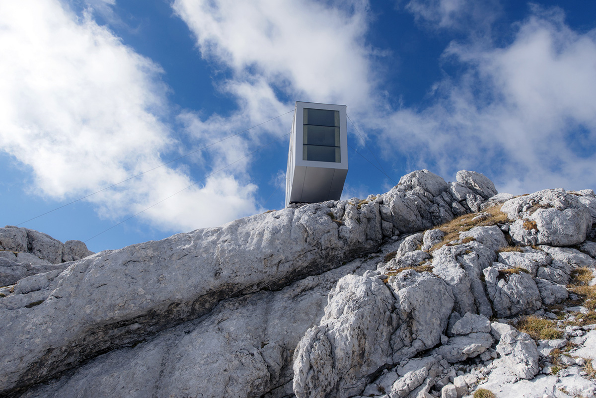 This Winter Cabin by OFIS Architects resists to gravity on Slovenia&rsquo;s rocky mountains