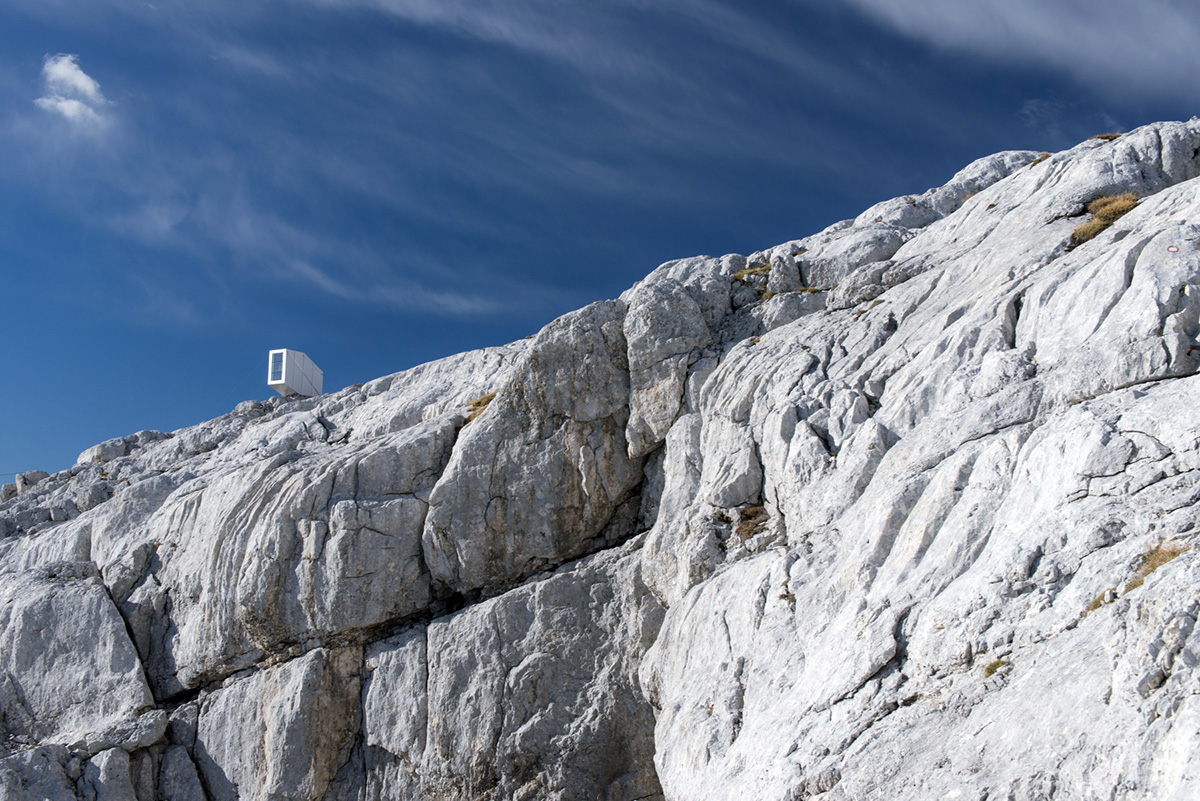 This Winter Cabin by OFIS Architects resists to gravity on Slovenia&rsquo;s rocky mountains