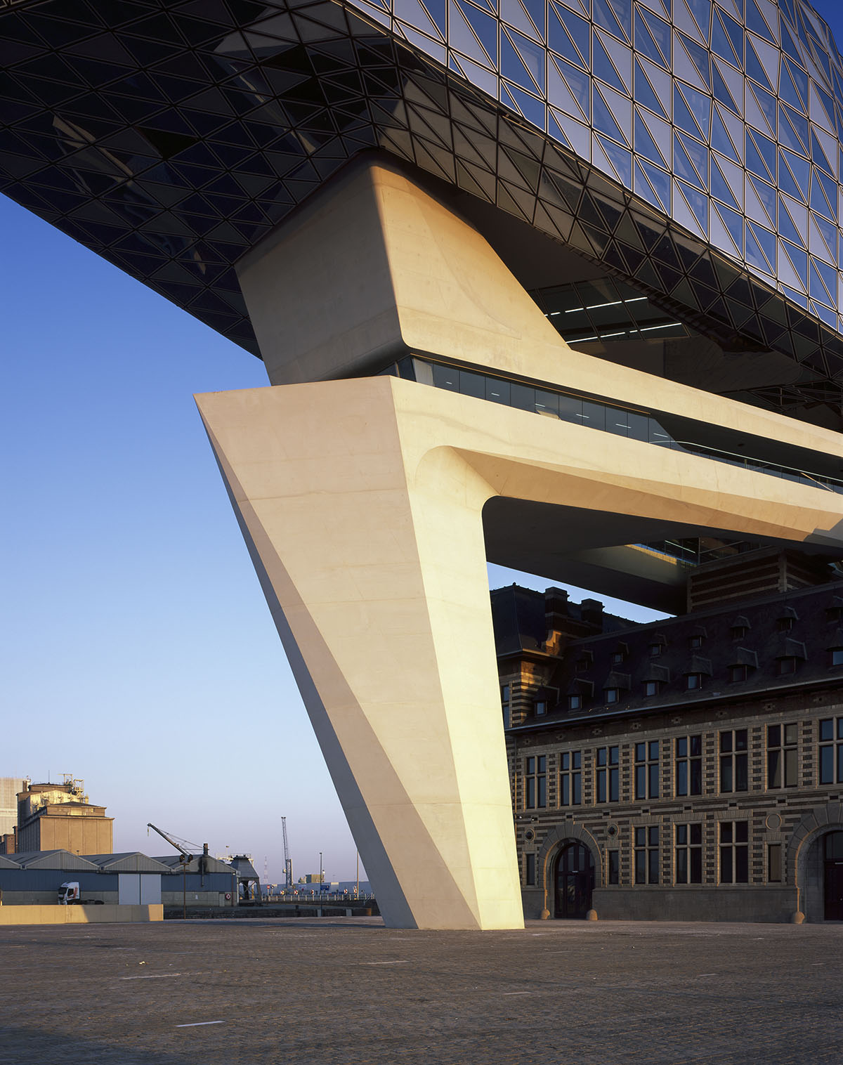 Zaha Hadid Architects crowns Belgium’s historic Antwerp Port Building with a floating glazed tower